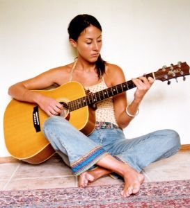 girl playing guitar